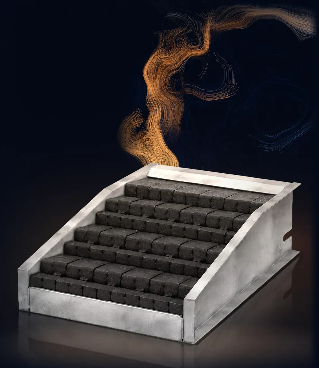 The stepped grate from PelleTech: the grate elements in steps within a steel frame, with warm smoke rising