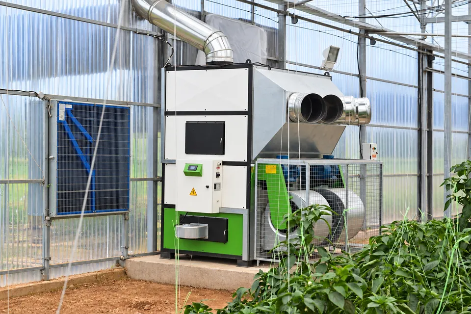 The PelleTech AERO among the plants in the greenhouse.