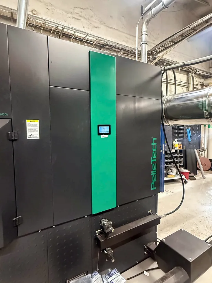 One of the two PelleTech IDRO 400 boilers, with the touchscreen in the green column.